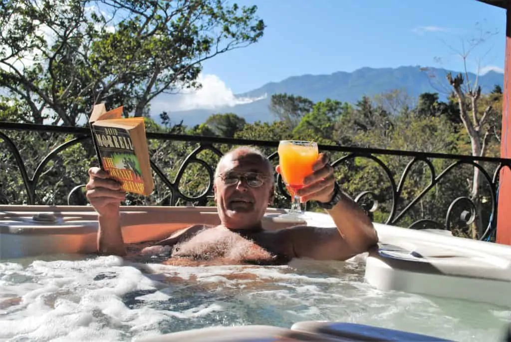 richard detrich in hot tub on his patio in panama
